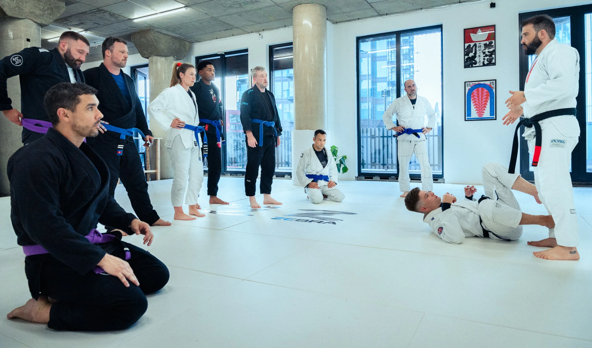 Adults training Brazilian Jiu-Jitsu at Stance Jiu Jitsu Academy in Woolwich